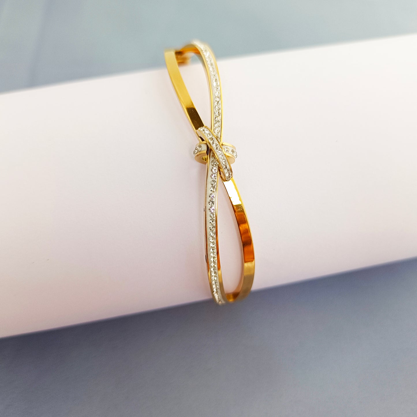 Gold Crystal Knot Bangle Bracelet – Minimalist Bow Design