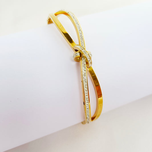 Gold Crystal Knot Bangle Bracelet – Minimalist Bow Design