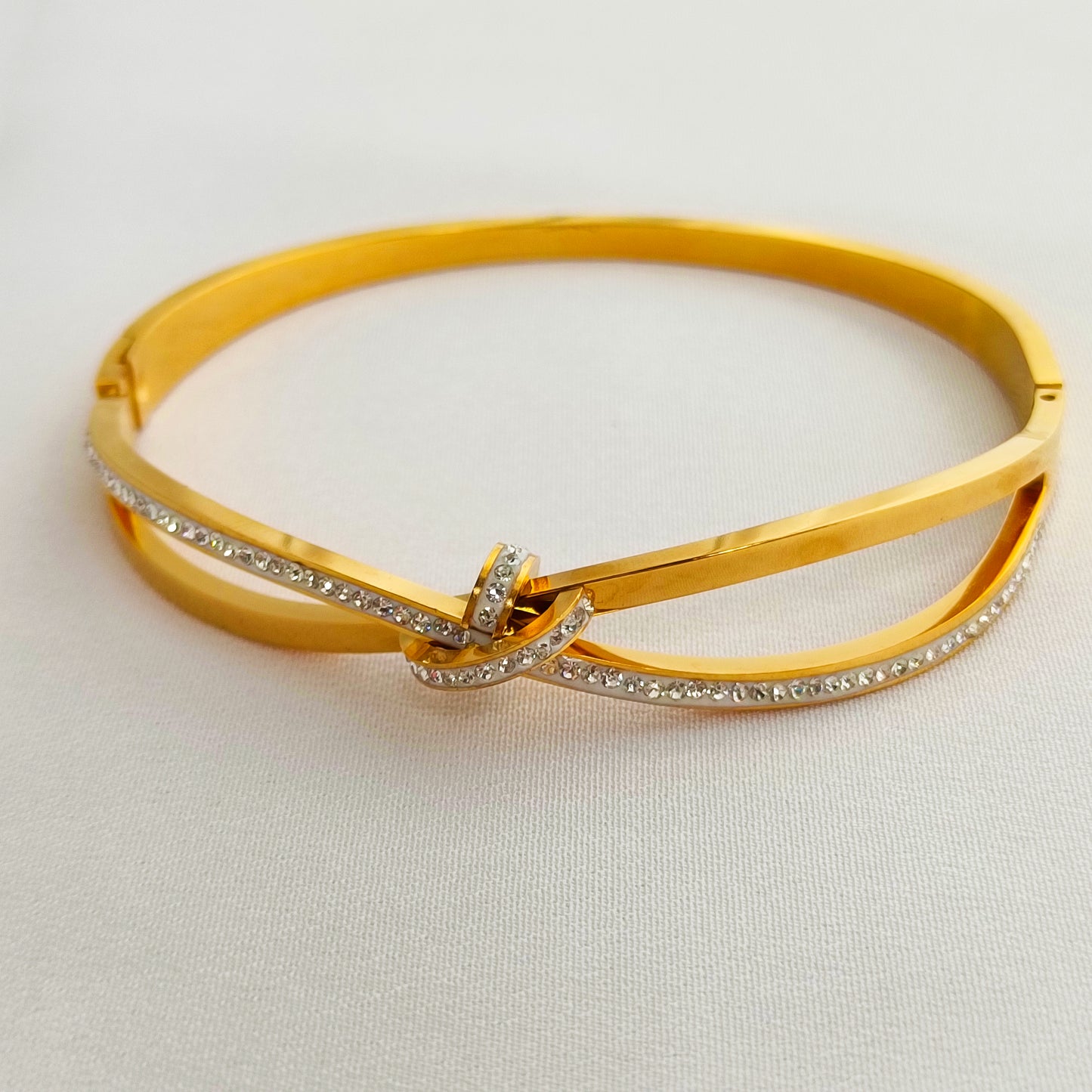 Gold Crystal Knot Bangle Bracelet – Minimalist Bow Design