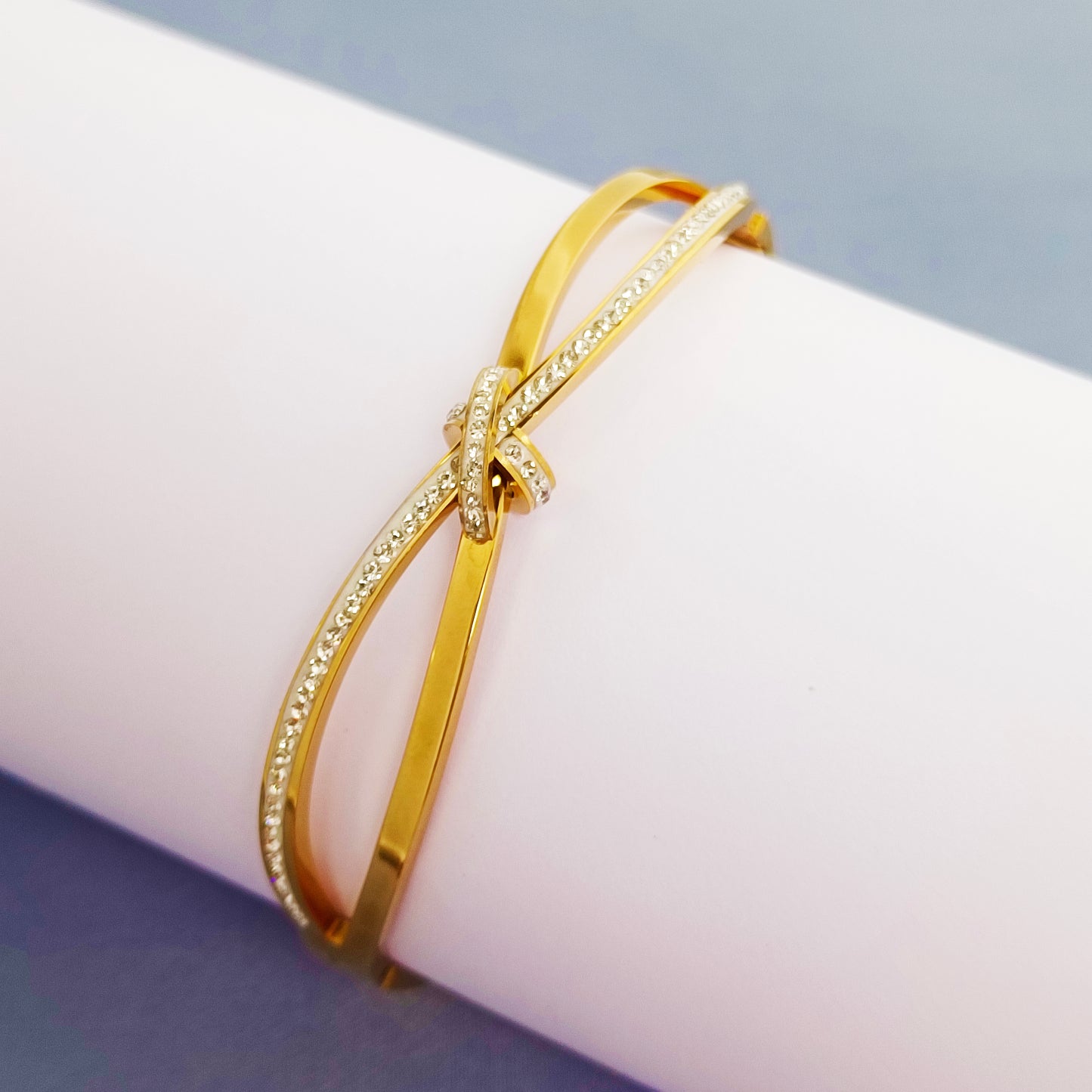 Gold Crystal Knot Bangle Bracelet – Minimalist Bow Design